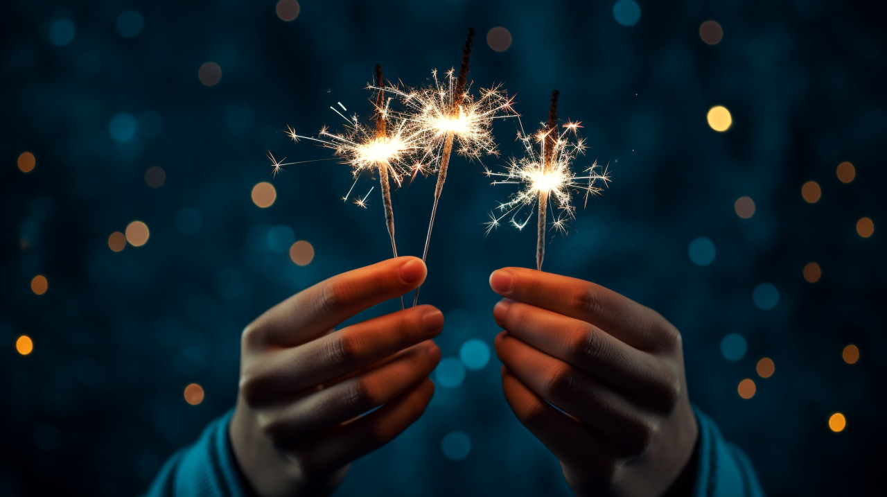 A person holding two sparklers in their hands, diwali festival stock image, diwali festival ai prompt