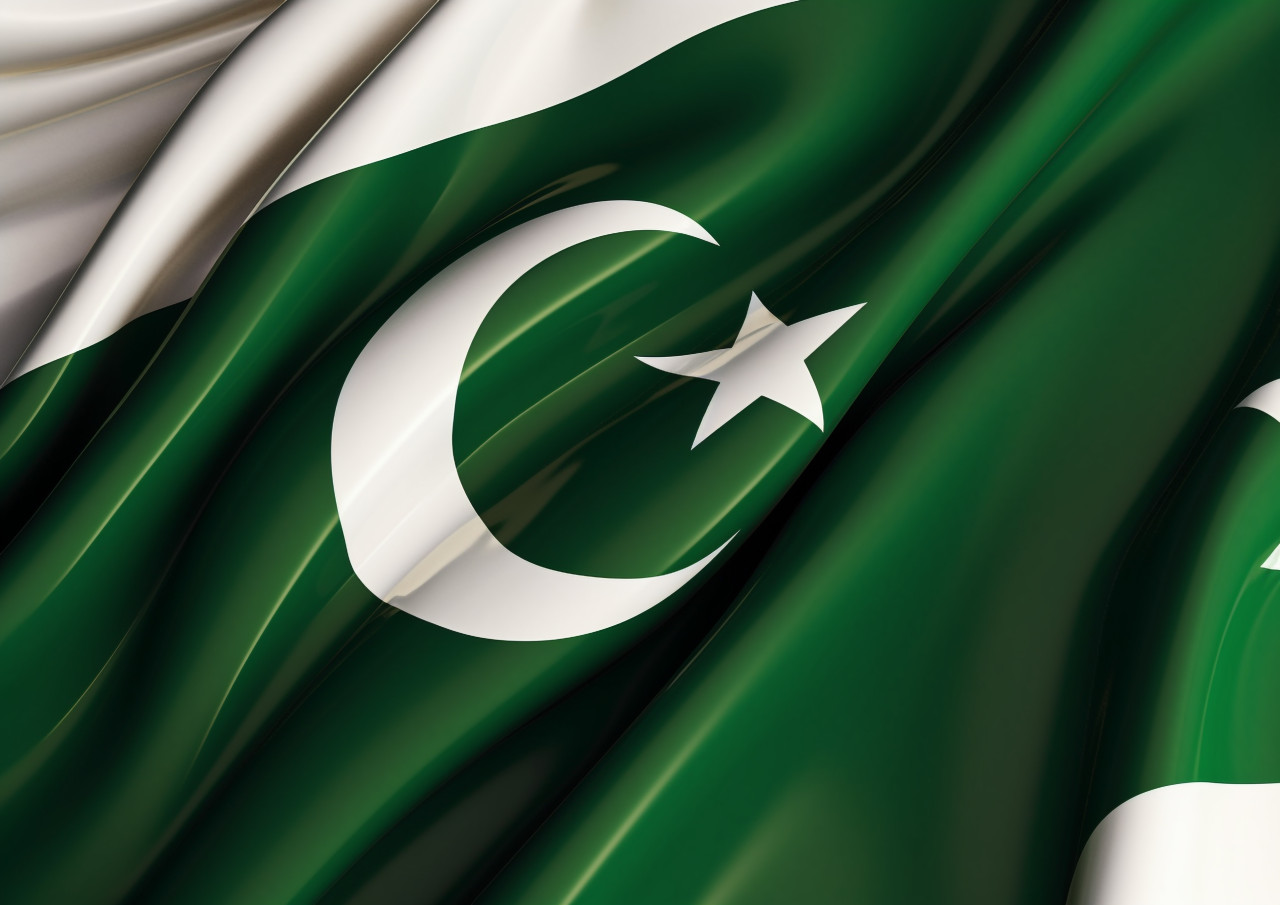 This picture of the pakistan flag shows the white and gold stars, pakistan independence day photos