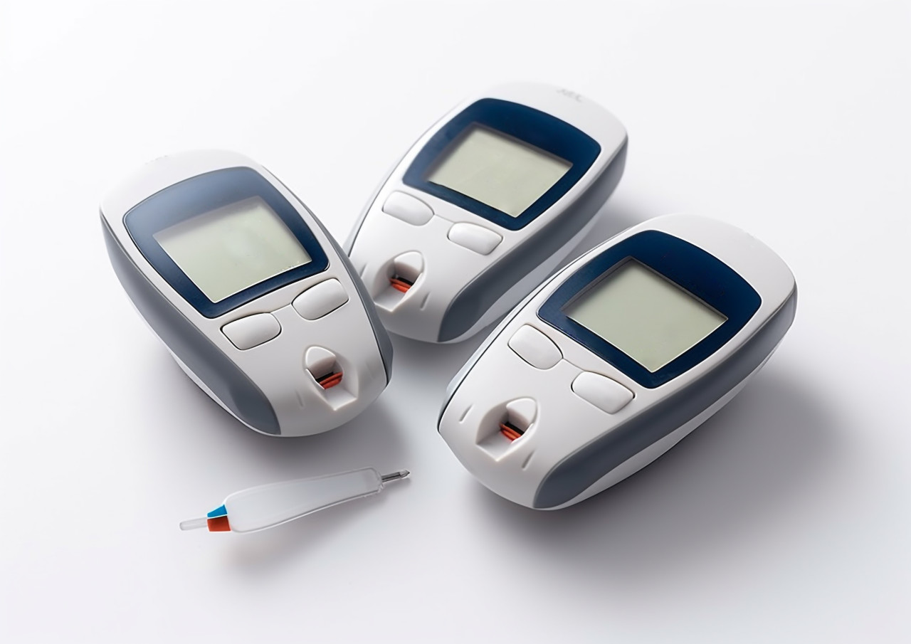A close-up of a blood sugar monitor, diabetes concept