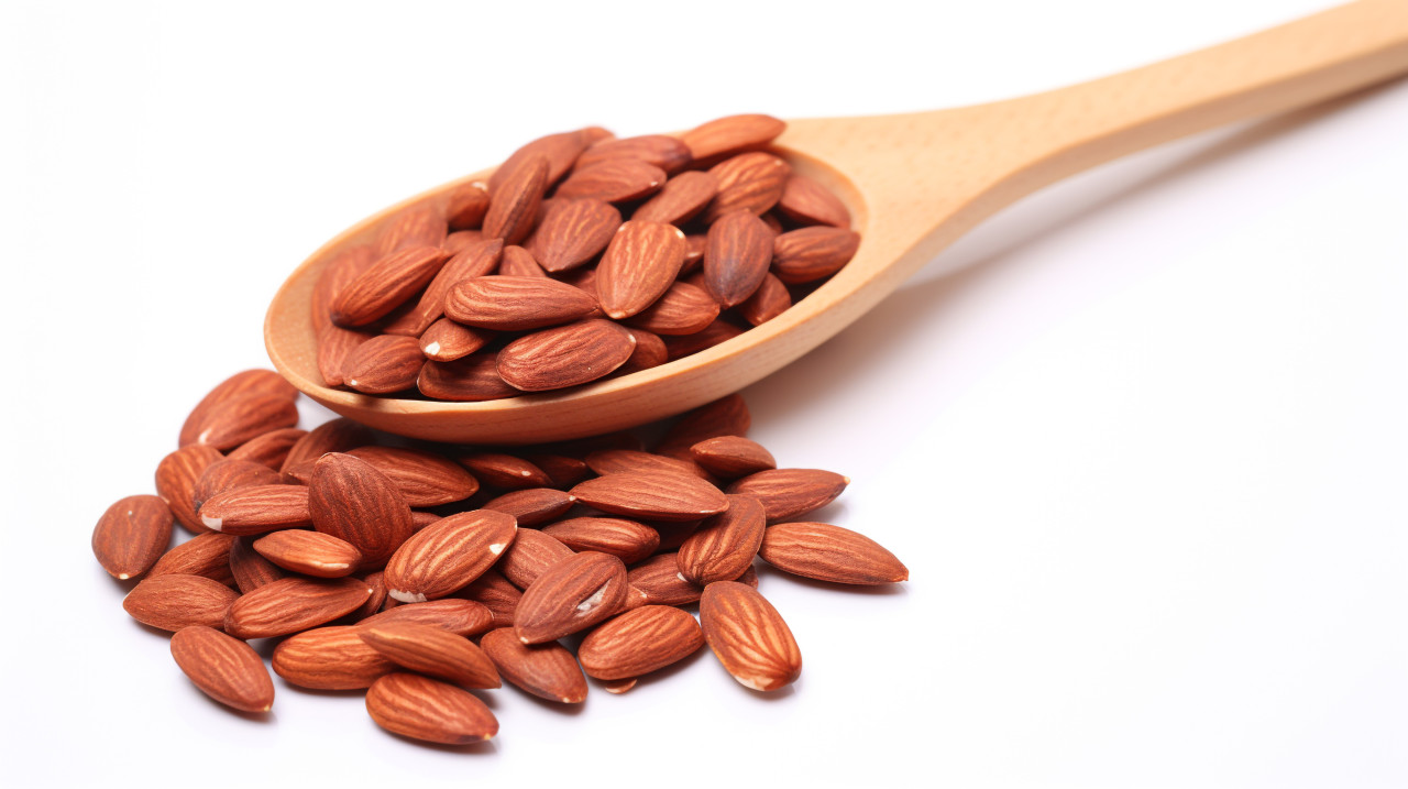 Almonds in a wooden spoon, almond image