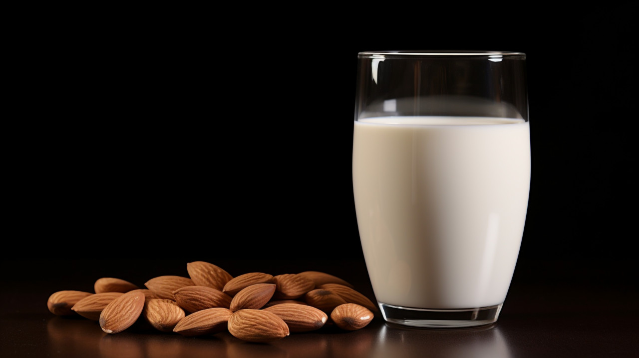 One glass of almond milk in white ware, almond image