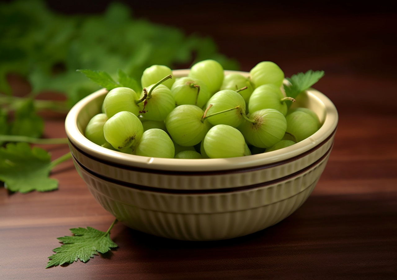 Fresh gooseberries in a bowl, gooseberry fruit image