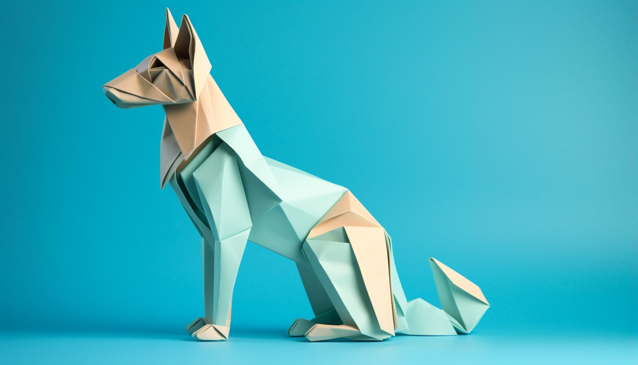 Origami fox on blue background