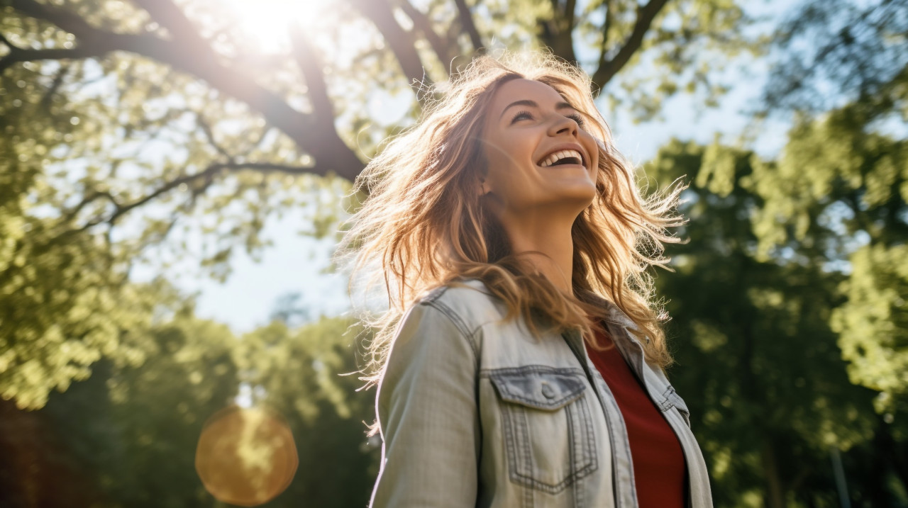 Woman enjoying sunshine in park