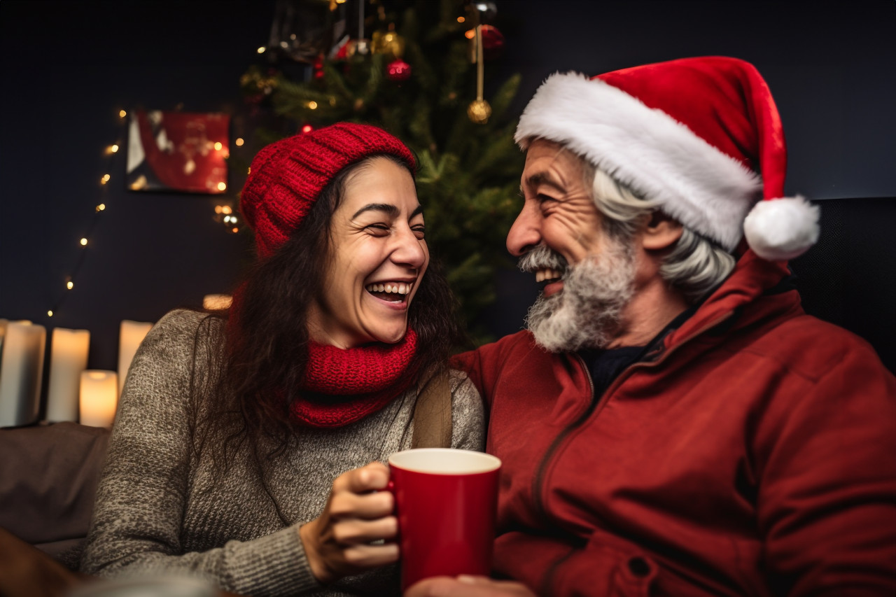 Picture of a happy latin couple enjoying christmas together at home, christmas festival people image