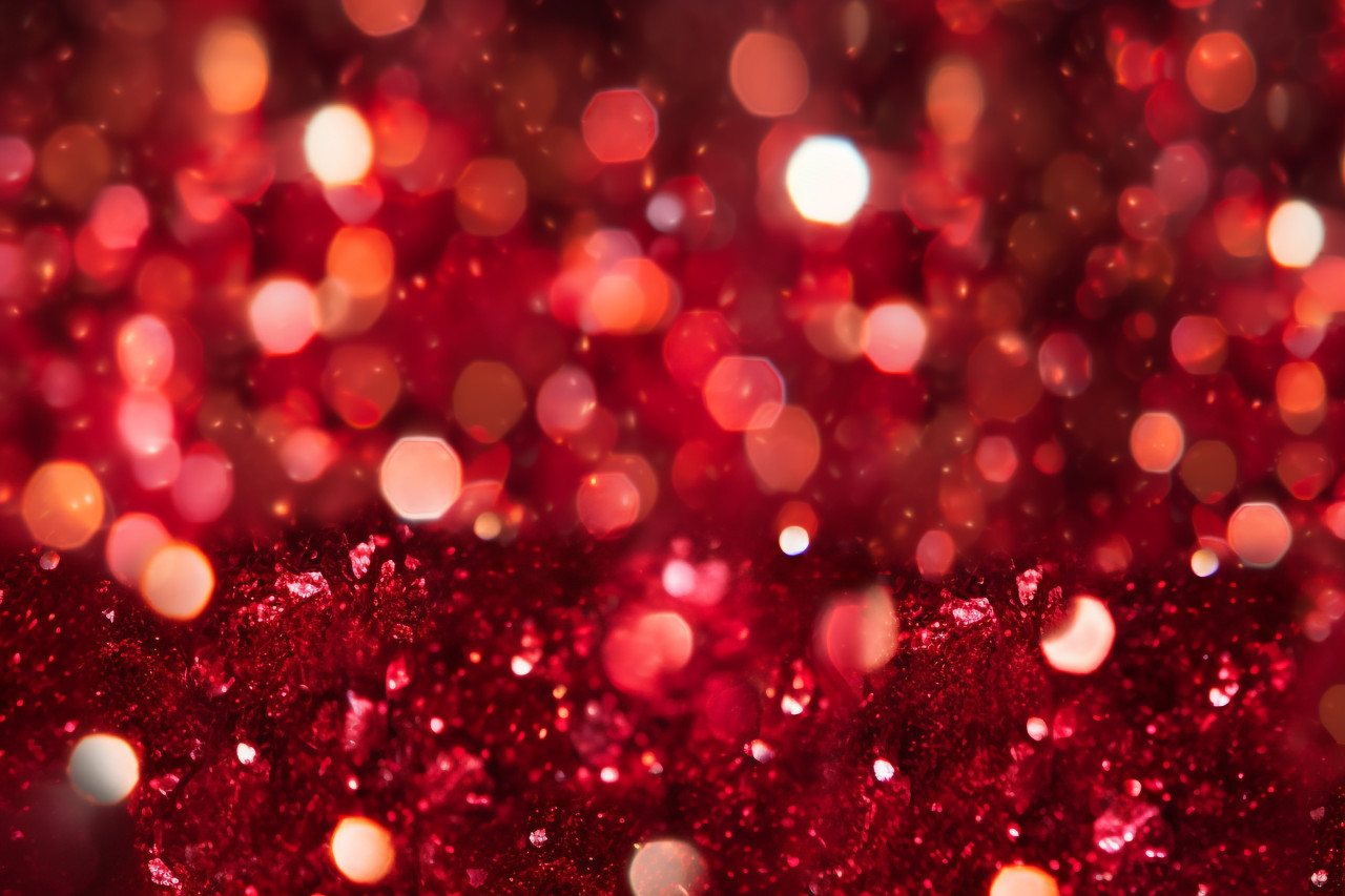 A picture of red, sparkling old fashioned lights in the background