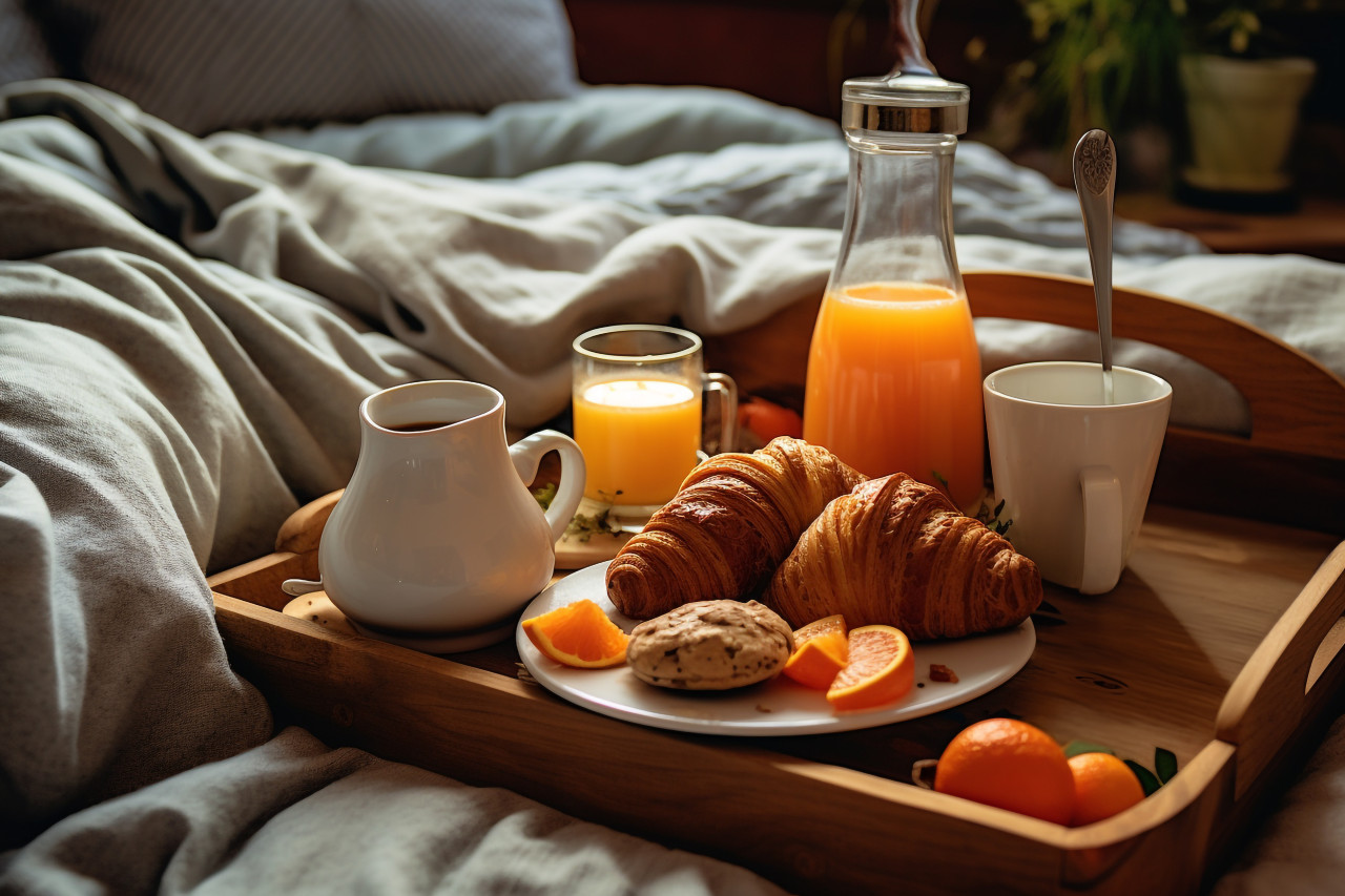 A picture of breakfast on a bed in a comfortable hotel room, food and drink at home photo