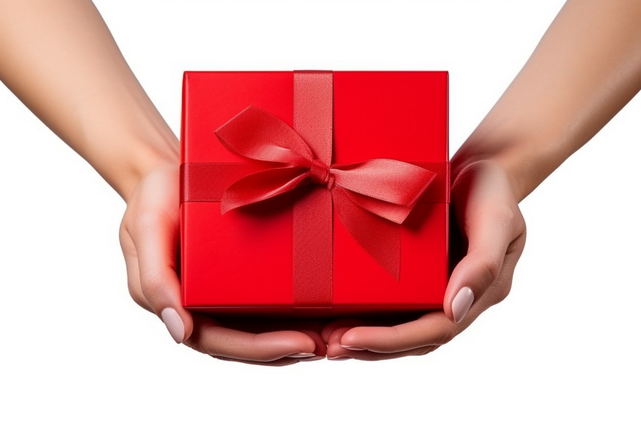 A picture of a woman holding a red empty box for a holiday like christmas or thanksgiving