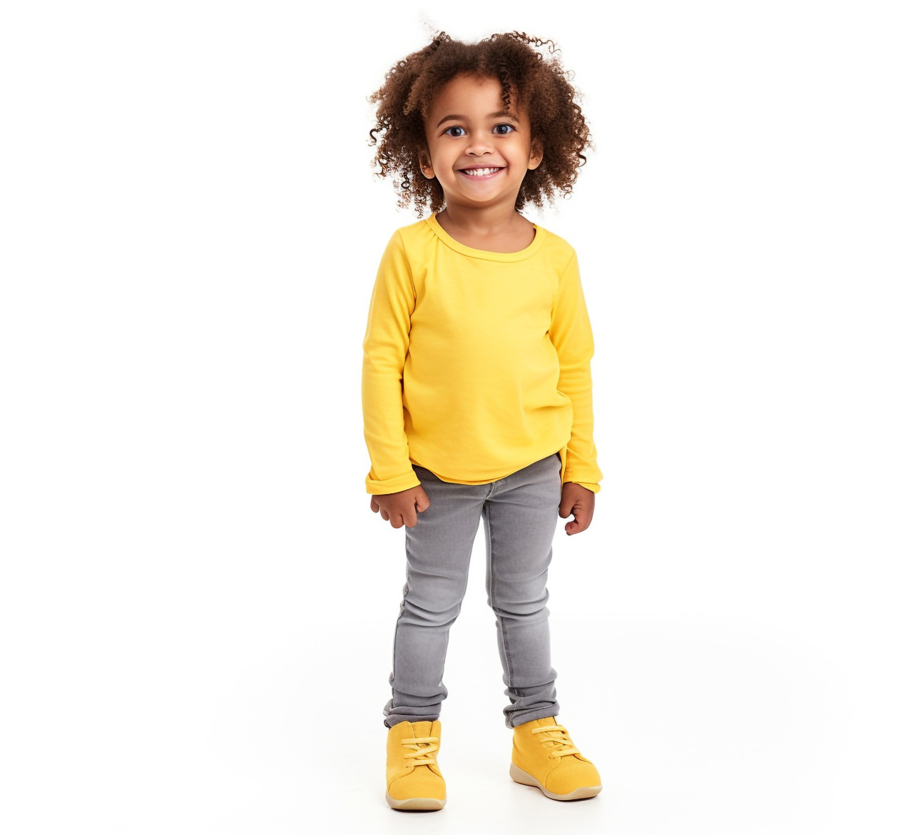 Smiling preschool girl on white background