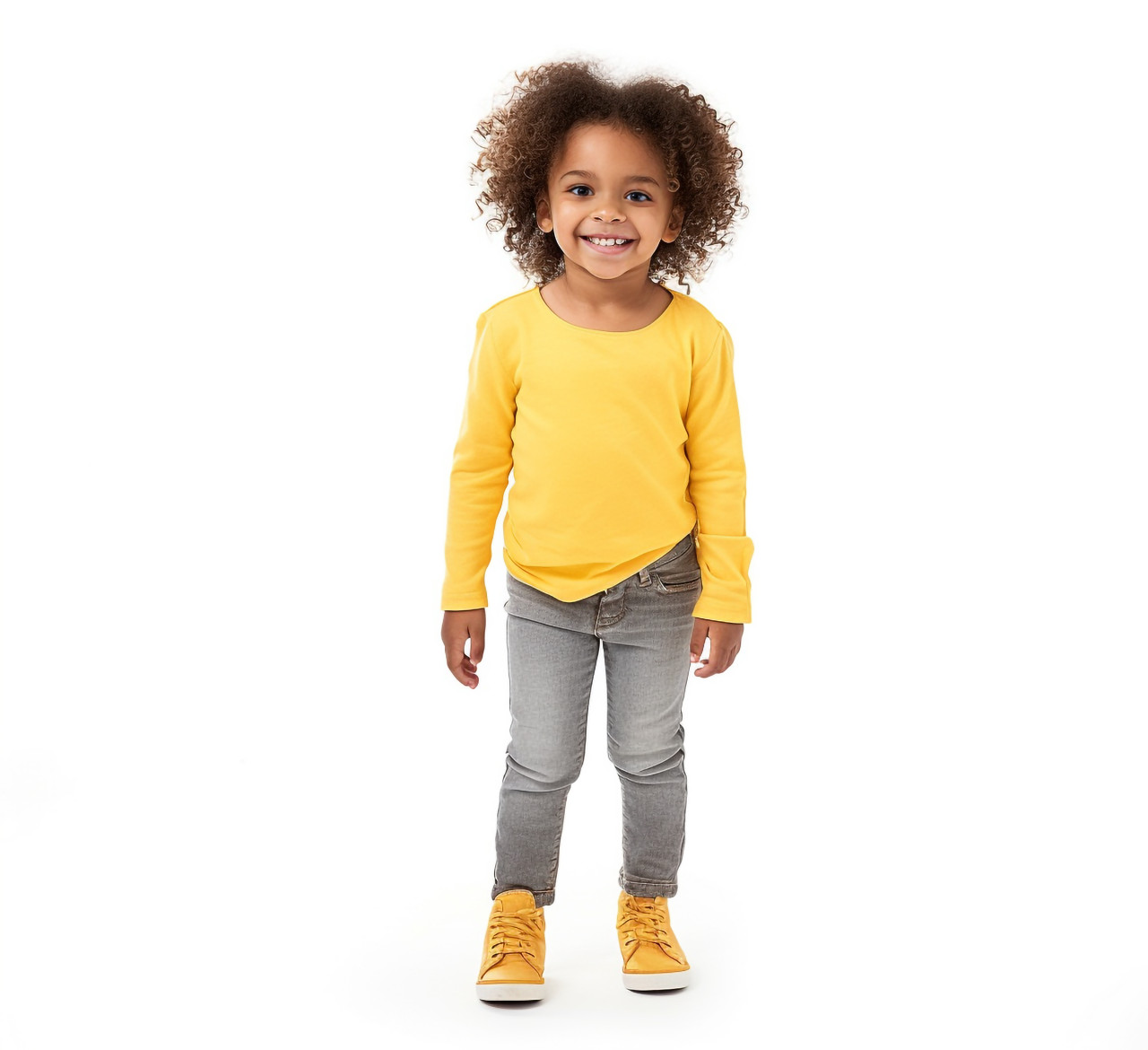 Smiling preschool girl on white background