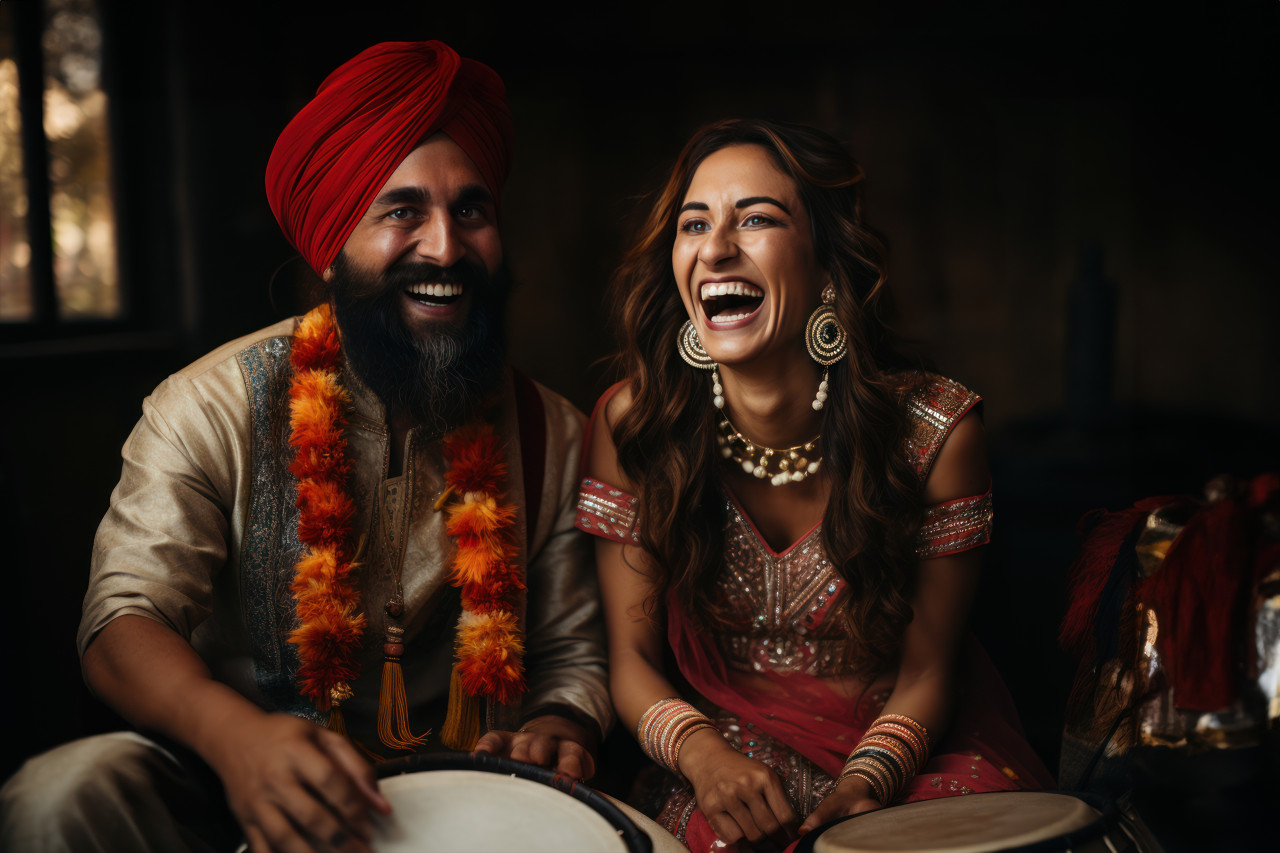 Man and woman in traditional dress with drums dancing to rhythmic beats in cultural celebration, lhori, makar sankranti
