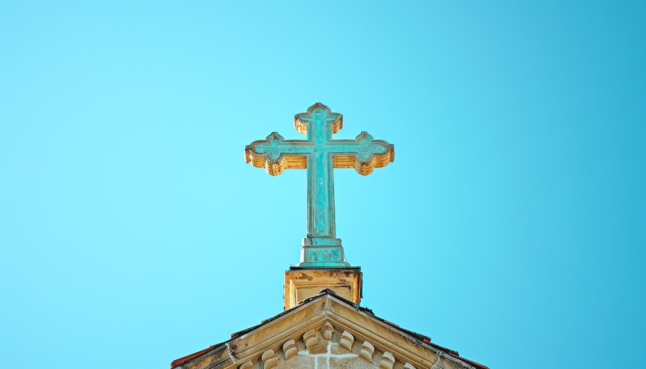 Religious cross atop church, palm crosses concept