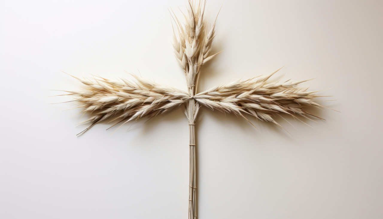 A crafted cross made of dried palm leaves symbolizing palm sunday for religious celebrations, palm sunday crafts photo