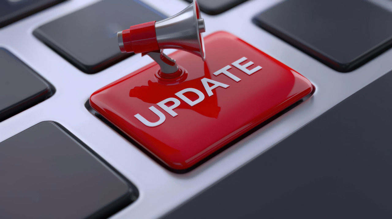 Red keyboard button with text update, technology upgrade concept, software update