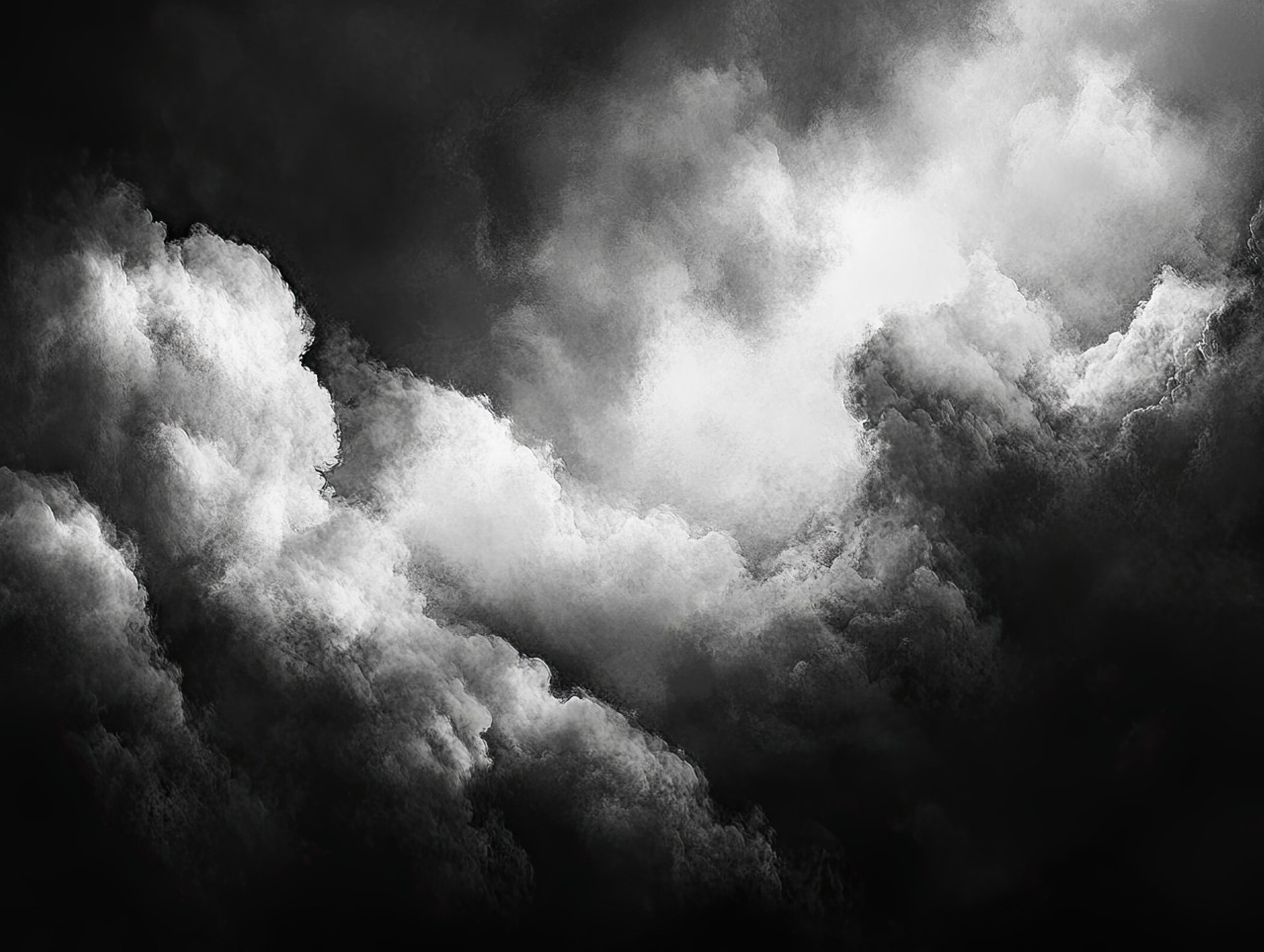 Dramatic storm clouds in grayscale, dark and swirling sky, powerful nature force, tension before the storm, moody and intense weather scene