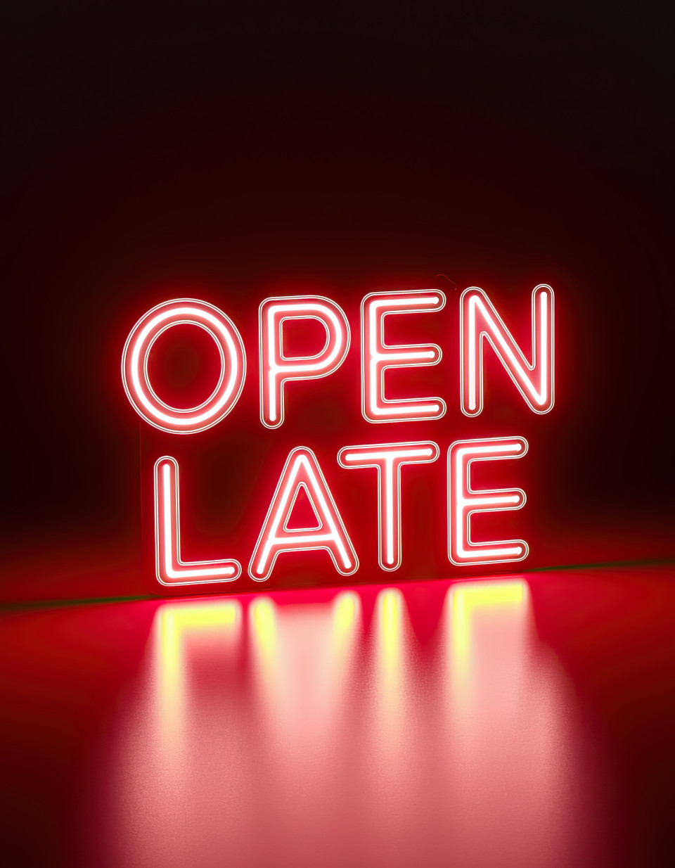 Neon glow typography "open late" in vivid red neon with retro font on black, cinematic neon sign, glowing lettering design, ai image prompts, ideogram prompt.