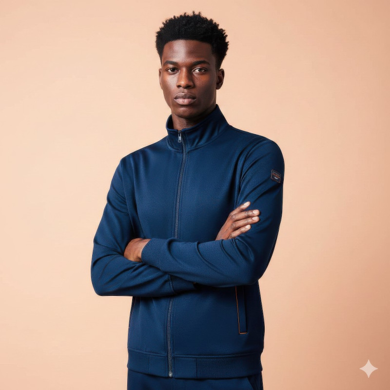 Nigerian man in navy zip jacket with confident arms-crossed pose google gemini fashion product model prompt