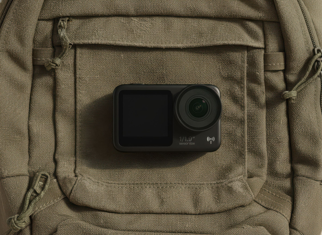 Action camera flat lay on backpack fabric studio shot google gemini prompt