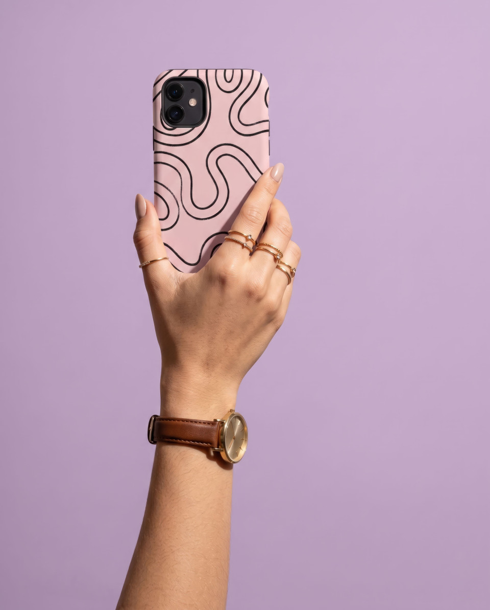 Hand holding phone case lilac background fashion accessory google gemini prompt