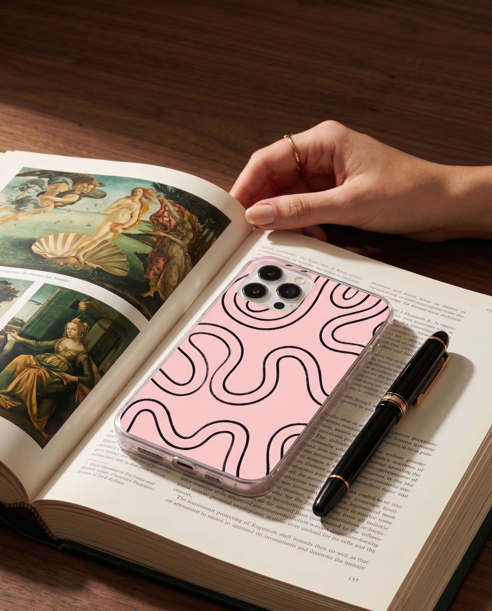 Phone case on book with pen artistic still life composition google gemini prompt