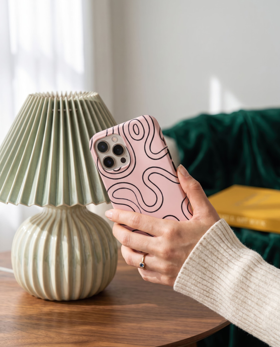 Phone case lifestyle close up near lamp modern interior google gemini prompt