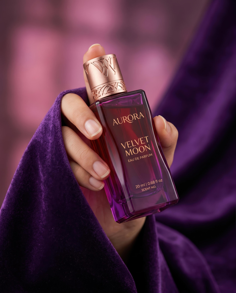 Perfume bottle held in hand with violet silk google gemini prompt