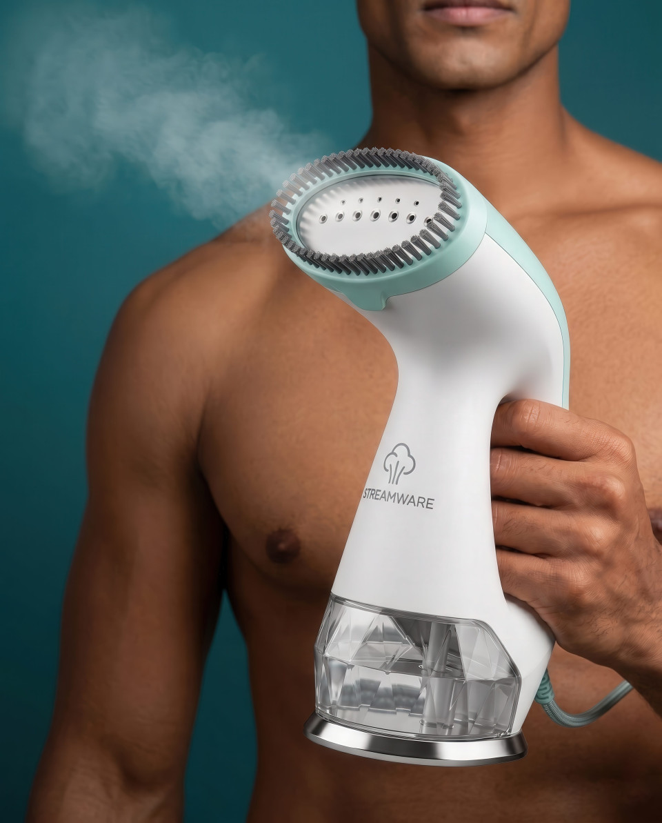 Man holding compact garment steamer with gentle steam google gemini prompt