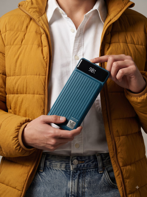 Fashion Editorial Product Photography Prompt Model Holding Power Bank Outdoors