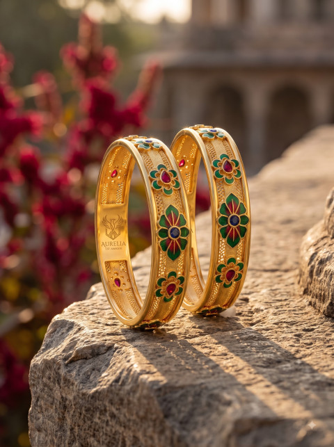 Gold Enamel Bangles on Sunlit Heritage Stone Wall