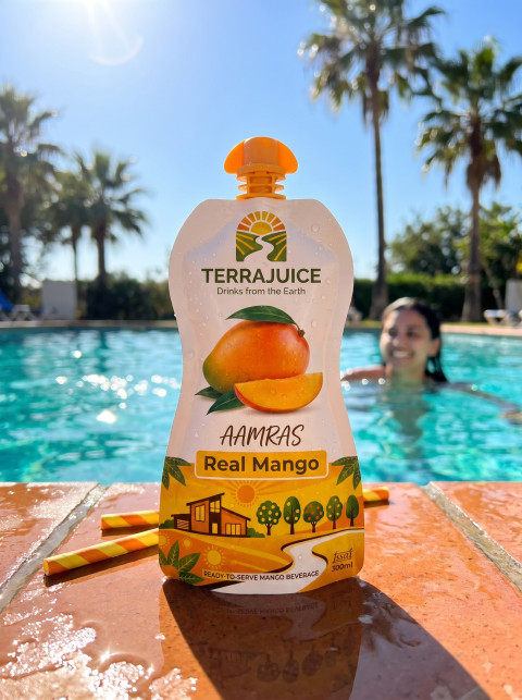 Mango Drink Pouch Poolside Summer Lifestyle Packshot