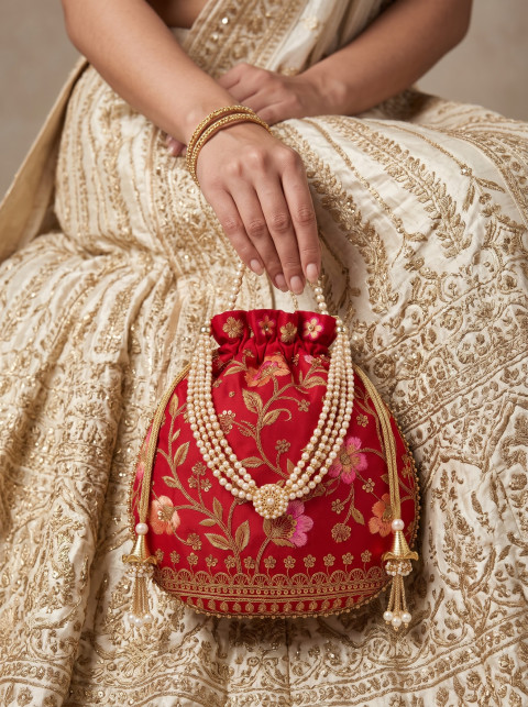 Red Embroidered Potli on Ivory Gold Lehenga AI Lookbook Fashion Product Photography Prompt