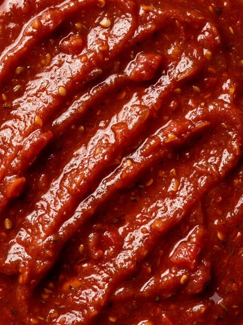 Rich Marinara Sauce Texture Macro Shot with Herbs