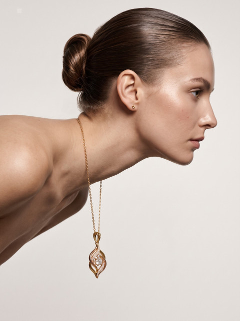 Side Profile Model with Gold Pendant Jewelry Photography Prompt 